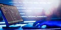 Abstract software development concept with code and laptop on blurred background representing programming, coding and Royalty Free Stock Photo