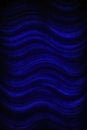 Abstract Sound Wave Visualization in a Dark, Atmospheric Studio Abstract, glowing neon blue and purple sound waves visualized in a Royalty Free Stock Photo