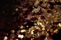 Abstract sparkle gold and burgundy glitter background, brilliant light AI Generated