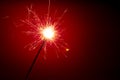 Abstract sparkler on red background Royalty Free Stock Photo