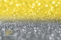 Blurred glitter background yellow gray color.