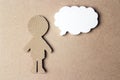 Abstract speaker silhouette with speech bubble on brown paper background Royalty Free Stock Photo