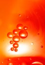 Abstract spheres on blurred background. Oil drops in a water. Royalty Free Stock Photo