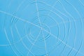 Abstract spiderweb, white threads on blue background Royalty Free Stock Photo