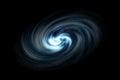 Abstract spiral galaxy with light blue smoke on black background Royalty Free Stock Photo