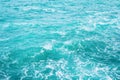 Abstract splash turquoise sea water for background close up Royalty Free Stock Photo