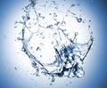 Abstract Splash of Water on a Blue Background Royalty Free Stock Photo