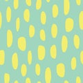 Abstract spot shapes seamless vector pattern. Yellow lime marks on green background. Modern strokes design for fabric, packaging ,