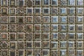 abstract square pixel mosaic wall background and texture. brown glass mosaic tile background pattern Royalty Free Stock Photo