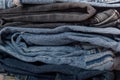 Abstract Stack of jeans. Background fashion jeans texture Various Shades Denim. Canvas denim texture. Blue