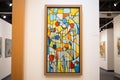 abstract stainedglass art piece displayed at an exhibition
