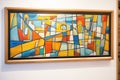 abstract stainedglass art piece displayed at an exhibition