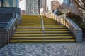 Abstract stairs with metal railings in the city. Abstract steps, cement stairs,wIde stone stairway,wide stone stairs Royalty Free Stock Photo