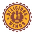 Abstract stamp or label with the text Delicious Wings Royalty Free Stock Photo