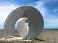 Abstract statues of spiral, forms of bekonechnosti on Batumi Primorsky Boulevard or Batumi Beach. Georgia, Batumi, April 17, 2019 Royalty Free Stock Photo