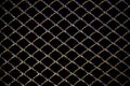 Abstract steel grid from car radiator, Black background Royalty Free Stock Photo