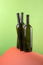 Abstract still life with color background and three glass bottles Royalty Free Stock Photo