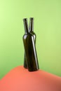 Abstract still life with color background and two glass bottles Royalty Free Stock Photo