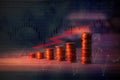 Abstract stock data concept or background with stack of coins and candlesticks Royalty Free Stock Photo