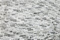 abstract stone wall made of gray marble tiles, selective focus, copy space. Wallpaper Royalty Free Stock Photo