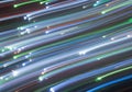 Abstract streaks of colorful light trails in motion blur Royalty Free Stock Photo