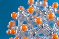 Abstract structure displays orange and silver spheres linked by clear rods on a blue backdrop Royalty Free Stock Photo