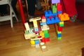 An abstract structure made with plastic and wooden toys