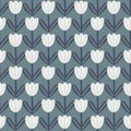 Abstract style seamless pattern in doodle style with white tulip shapes. Navy blue pale background Royalty Free Stock Photo