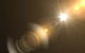 Abstract sun burst with digital lens flare background.Abstract digital lens flares special lighting effects on black