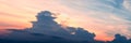 Abstract sunset with beautiful color sky and clouds nature panorama background. Moody pink, orange, purple clouds sun set sky Royalty Free Stock Photo