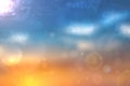 Abstract sunset illustration. Abstract evening or sunset mood background texture with orange and gold colored bokeh lights and Royalty Free Stock Photo