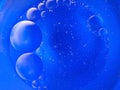 Abstract surreal blue round bubbles look like tiny planets macro