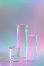 three clear glass cylinder podiums on pastel holographic colored background