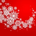 Abstract swirl of paper snowflakes on a red background