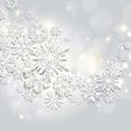 Abstract swirl of paper snowflakes on a silver background Royalty Free Stock Photo