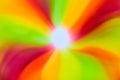 Abstract swirl rainbow star burst white center flowing vibrant colors background asset Royalty Free Stock Photo