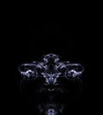 Abstract symetrical shaped smoke against black background