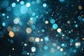 Abstract teal and gold bokeh lights and sparkling particles on a dark backdrop Royalty Free Stock Photo