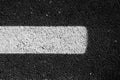 Abstract texture of a asphalt road with white paint Royalty Free Stock Photo