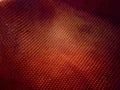 Abstract texture dark red reflective background with dotted surface