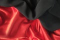 abstract texture of draped red velvet background. eautiful textile backdrop. Close-up. Top view