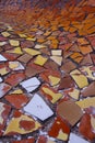 The concept of fallen autumn leaves with broken tiles