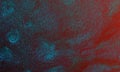 Abstract texture of shiny blue color over red color