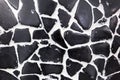 Abstract texture of wall of black stone on a white background Royalty Free Stock Photo