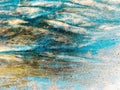 abstract texture in warm earth tones mixed with blue, ideal for use as a content or texture background