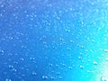 Abstract, texture, water droplets on car glass, image for blue background, rainy season concept, selectable focus. Royalty Free Stock Photo