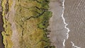 textures and veins cutting thru the wetlands of a tidal river system in Tasmanias Swan river area, Australia