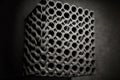 abstract three-dimensional grey mesh pattern on black background 3d render digital illustration