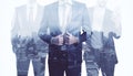 Abstract three transparent headless business men standing on blurry city background. Success, teamwork, partnership, future and