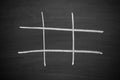 Abstract Tic Tac Toe Game Competition with Wood black board. XO Win Challenge Concept on black board Royalty Free Stock Photo